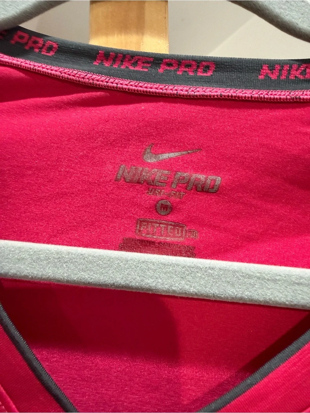 Nike Women’s Long-Sleeve V-Neck Performance Tee - Fuchsia